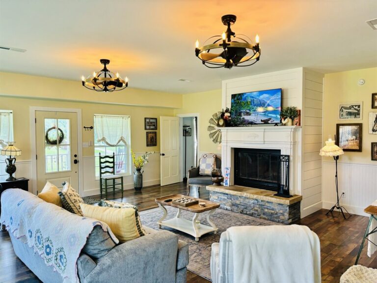 Farmhouse Cabin 19 A beautiful, spacious living room. You’ll feel the nostalgia and homeyness in this space.