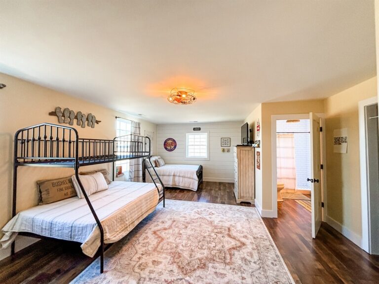 Farmhouse Cabin 39 Upstairs bedroom , 2 double beds and one twin