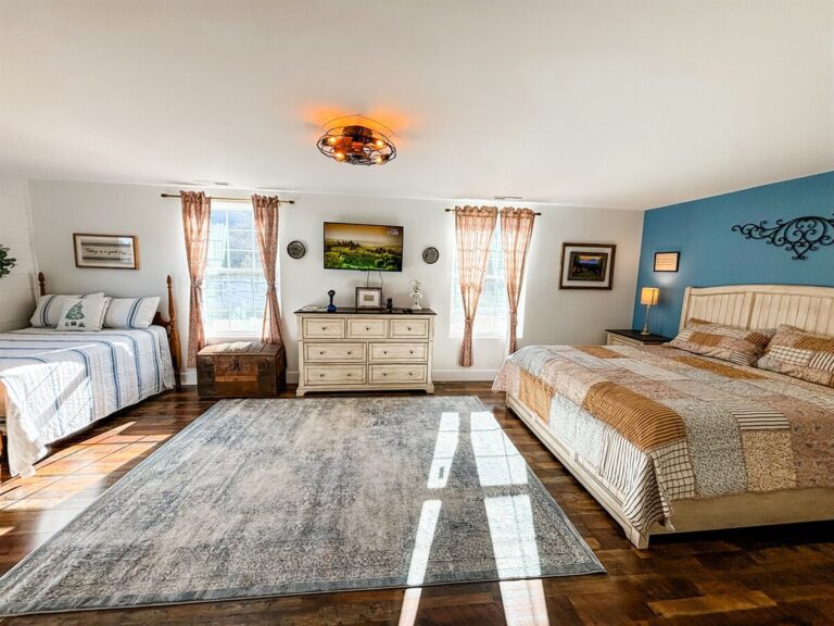 Farmhouse Cabin 36 Upstairs bedroom with King and double bed, lots of privacy and space with ensuite bath