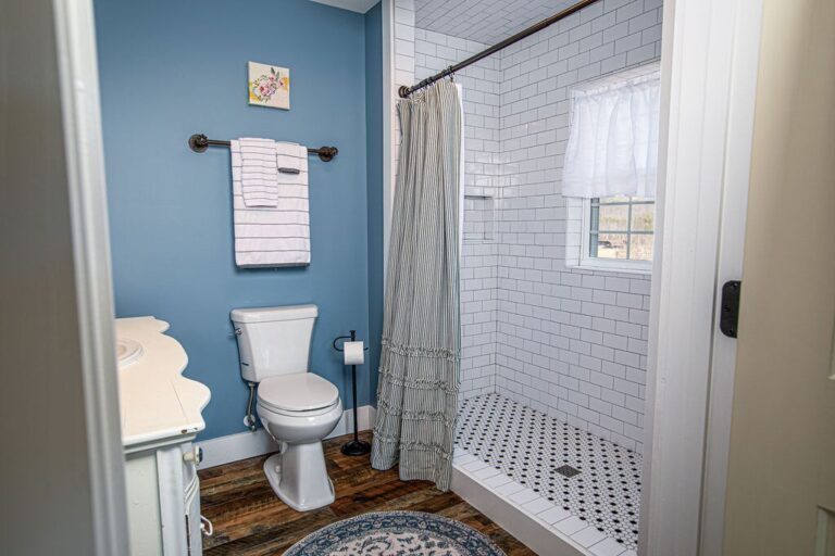 Farmhouse Cabin 37 then bathroom upstairs
